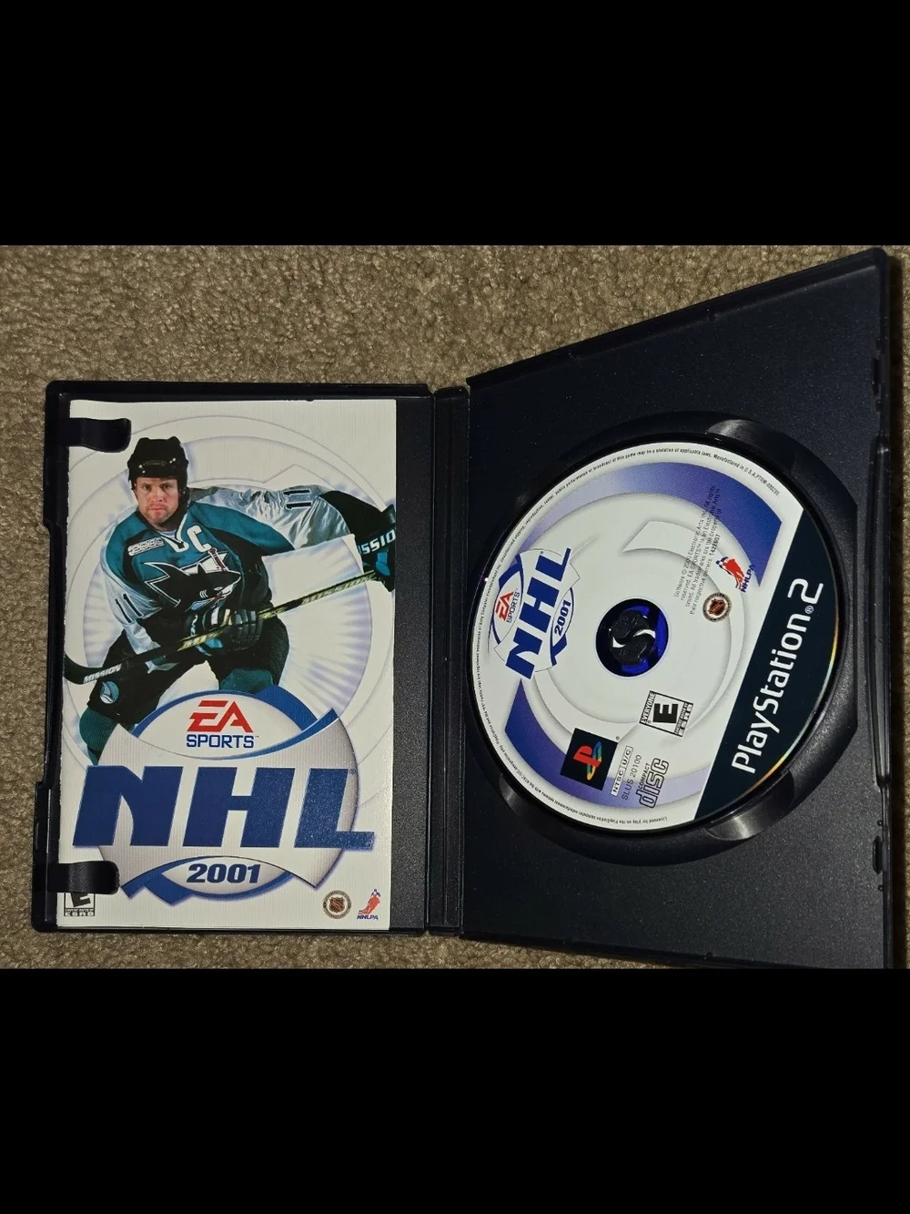 Ea sports NHL 2001 complete and tested for ps2.